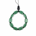 Jade green beaded phone wristlet on white background